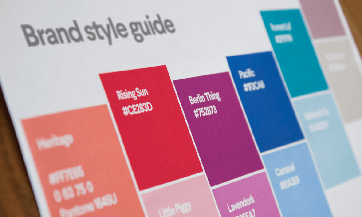 Brand style guide showing defined color swatches and HEX codes for consistent visual branding.